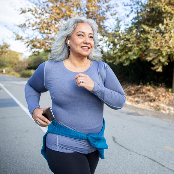 middle aged woman jogging