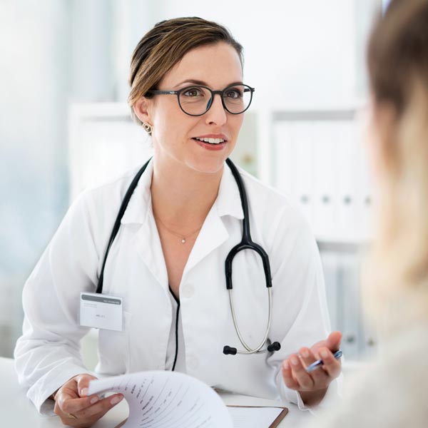 doctor talking to patient