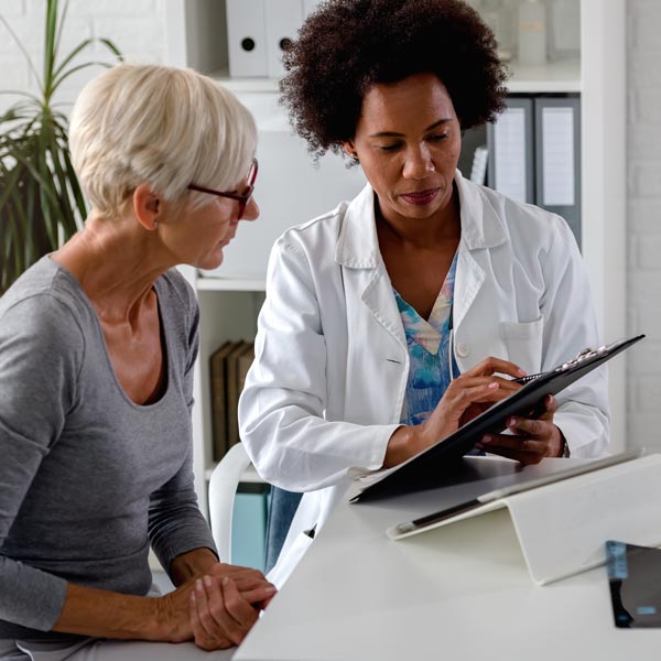 doctor talking to patient