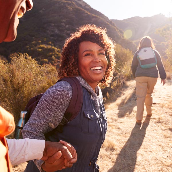 woman smiling on hike