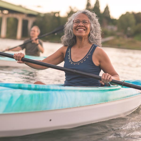 middle aged woman in kayak