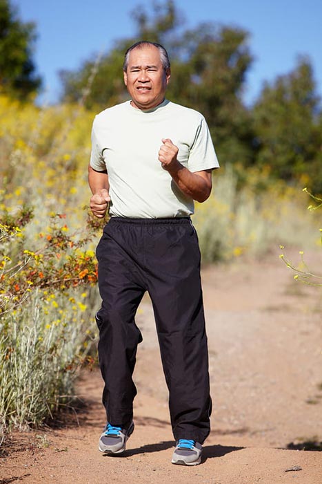 An elder man running