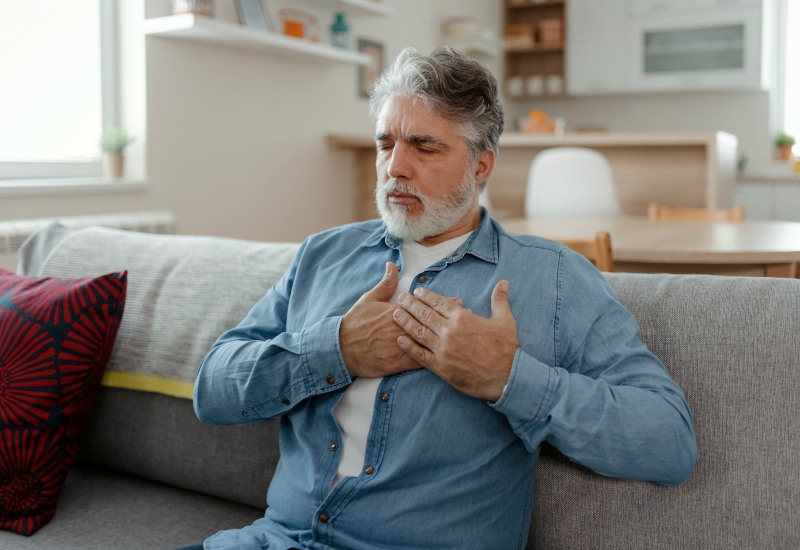 Man with chest discomfort showing bradycardia symptoms in Sun City, Glendale, and Peoria, AZ